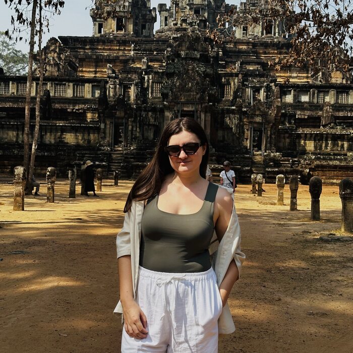Lady in front of a temple in Angkor Wat