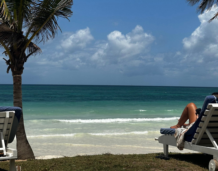 Lying on a sunbed on Diani Beach