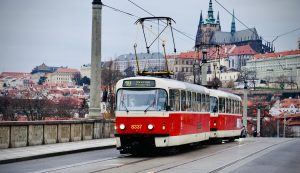Prague tram crossing the bridge below Prague castle.