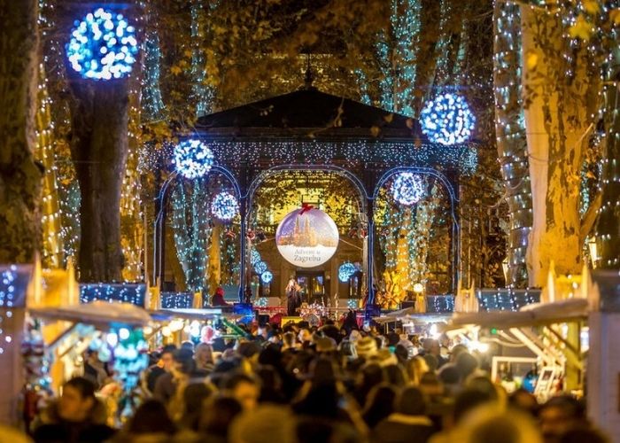 Zagreb Advent Christmas lights, stands and crowd.