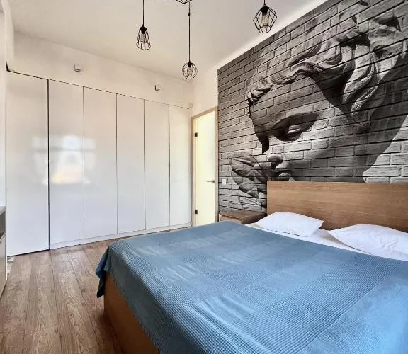 Spavaća soba apartmana BpHomes u Budimpešti.